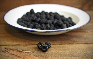 Fototapeta na wymiar Blackberries on wooden background