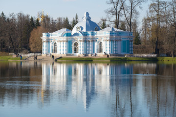 Fototapeta na wymiar Grotto Pavilion on the Great Pond. Tsarskoye Selo in the spring