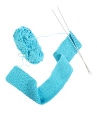 Ball of yarn and knitting needles