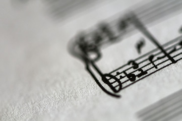 Detail of a music sheet score page. Shallow depth of field.