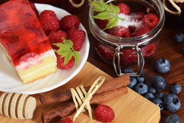 Tasty sweet cake with raspberries and jelly