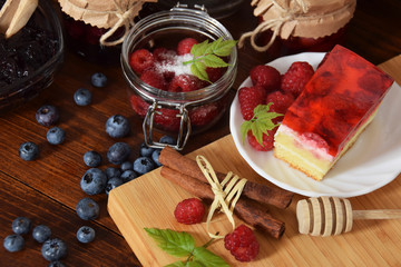 Tasty sweet cake with raspberries and jelly