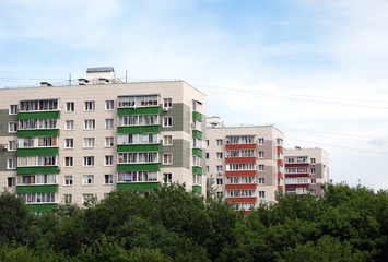 Dense urban development of apartment buildings in the green area of the city