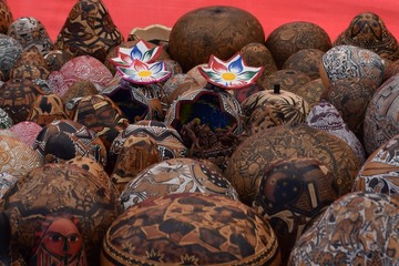 Intricately-carved gourds for sale at market in Peru