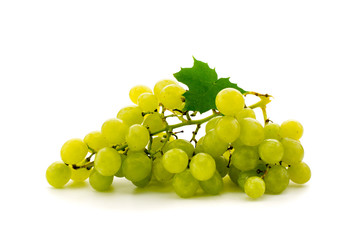 Green grapes with leaf on white