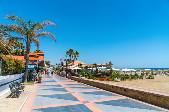 Benalmadena, Spain, june 27, 2017: Tourists strawling on the Benalmadena boulevard near Malaga