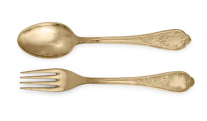 Golden spoon and fork isolated on a white background.
