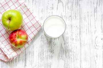 Kids breakfast with fruits on light wooden table background top view copyspace