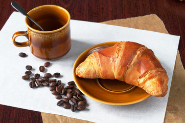 Croissant and cup