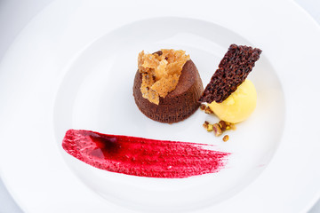 Chocolate fondant with lemon ice cream and raspberry sauce