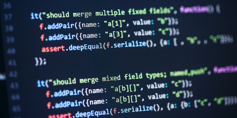 Software developer programming code