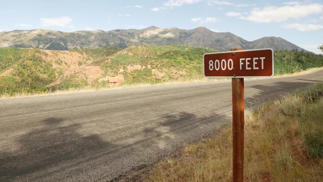 The Nebo Loop passes an 8,000 feet elevation sign.