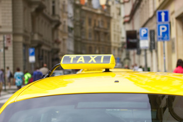 Taxi car in the city street  of Prague, Czech Republic