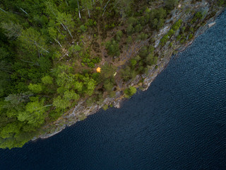Aerial view of a camping on a rocky coast