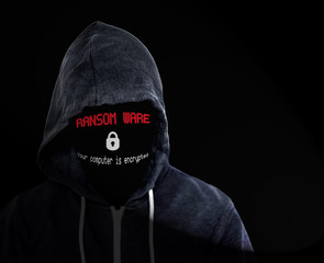 Ransomware Cyber Criminal in Black Hooded Top