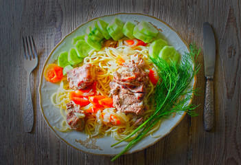 Dish home meat shpageti vegetables, delicious dinner