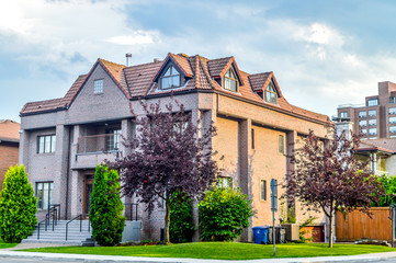 Expensive modern townhouses with huge windows in Montreal, Canada.
