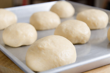 Fototapeta na wymiar Bread dough on baking tray prepare for bake
