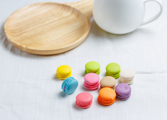 Colorful macarons cake on white background