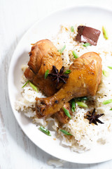 chicken legs steam with black sauce serve with rice