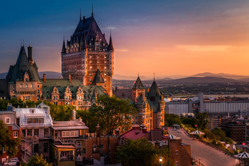 Naklejka premium Frontenac Castle in Old Quebec City in the beautiful sunrise light. High dynamic range image. Travel, vacation, history, cityscape, nature, summer, hotels and architecture concept