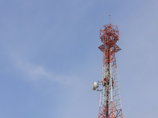 Workers demolition  telephone poles due to health complaints.