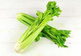 Fresh green celery isolated on white background
