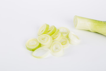 Green onion herb chopped on the white background.