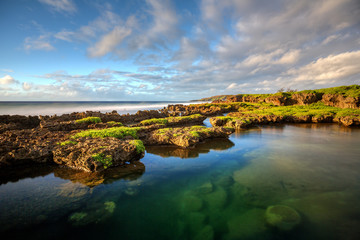 The clear tide pools that make up Inarajan Natural Pool Park on the island of Guam - obrazy, fototapety, plakaty