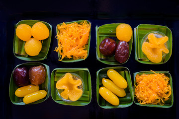 ancient Thai Dessert, thai sweet dessert set,egg yoke fudge balls cooked in syrup, Pinched gold egg yolks, appetizer