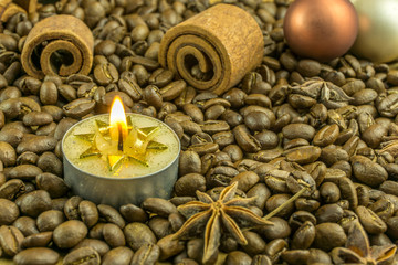 Obraz na płótnie Canvas Christmas decoration with coffee beans, christmas balls and candles