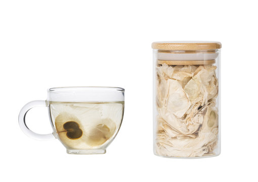 The Oroxylum indicum seed is used in the traditional Indian and Chinese medicine. And using it to make tea in a glass cup.