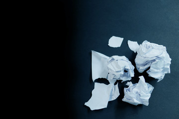 Crumpled sheet of paper to paper ball
