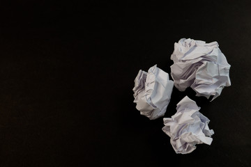 Crumpled sheet of paper to paper ball