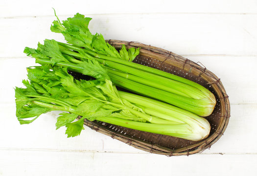Fresh green celery isolated on white background
