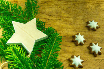 Christmas decoration with stars, Christmas balls and branches of a fir tree