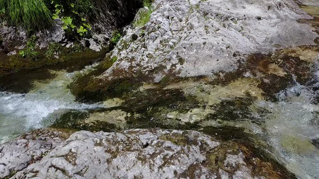The waterfalls, the stream and the clear and clear water of Val Vertova, a naturalistic oasis in the province of Bergamo, Italy