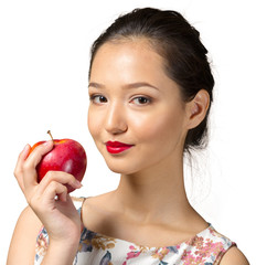 Smiling woman with red apple