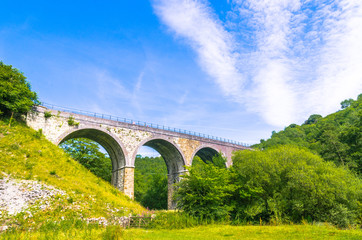 Fototapeta na wymiar The Headstone Viaduct at Monsal Dale over the River Wye in the Peak District, Derbyshire, England