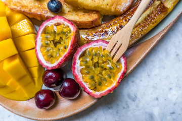 Very fruit toast- Banana/ cherry, passion fruit /mango and honey with watermelon juice.