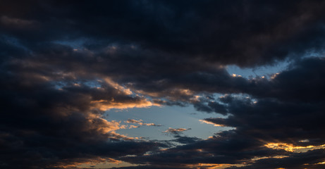 Dramatic sky with dark clouds - nature background.