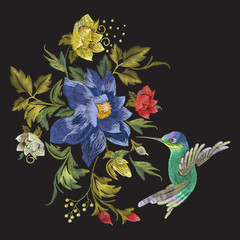 Embroidery fashion pattern with hummingbird and exotic flowers. Vector embroidered floral ornament with bird on black background for clothing design. © natagalitskaia