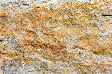 Natural texture of a dark yellow rock