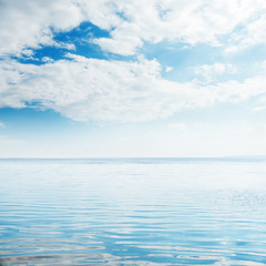 Obraz premium view to big river and clouds in blue sky