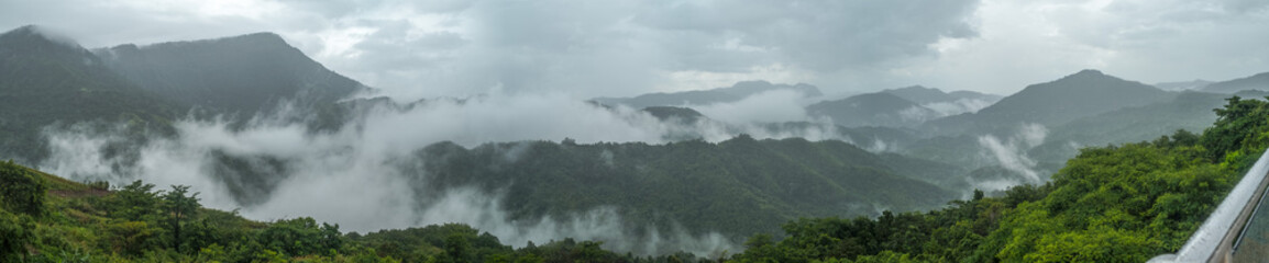 The panorama clouds, fog, moist after rained above mountain in thailand