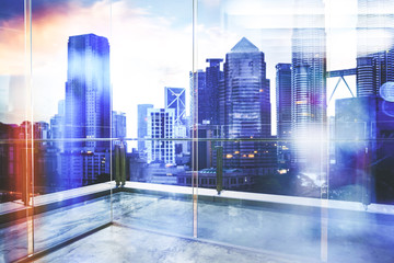 View of urban cityscape from empty business office with glass partition .