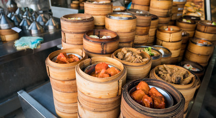 Group of dim sum are steaming on the stove  Chinese restaurant that is popular in Hong Kong.