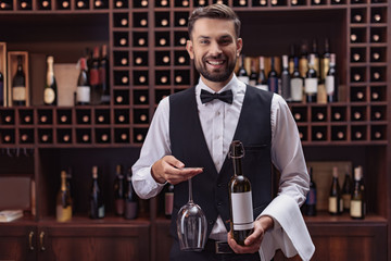 sommelier with wine and glass