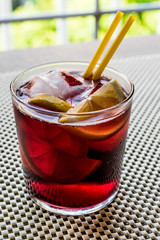 Americano Cocktail with lemon and ice.