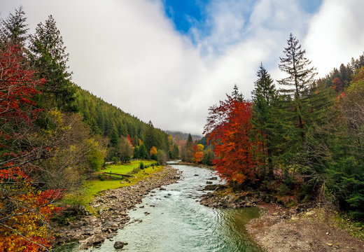 gorgeous autumn countryside landscape with forest river